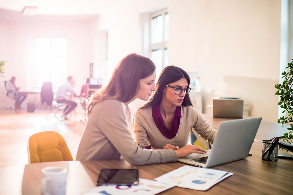 two-women-researching-together