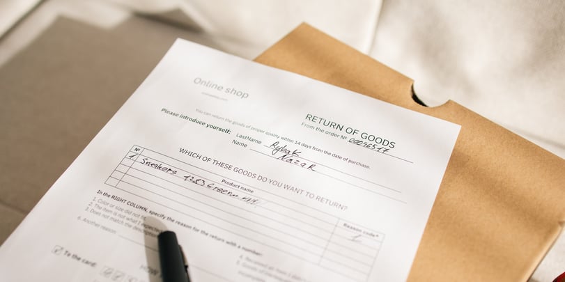 Paper form filled out with handwriting