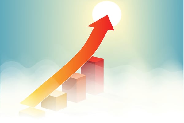 Red arrow pointing to success on graph chart with cloudy and sun blue sky background represents business growth concept.