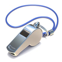 Silver whistle on blue cord