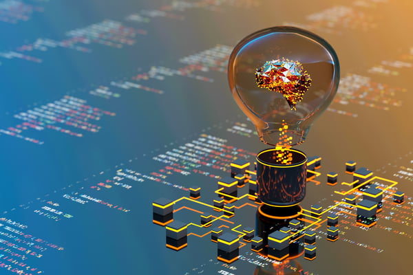 lightbulb containing an amber brain overlaying a computer network chart