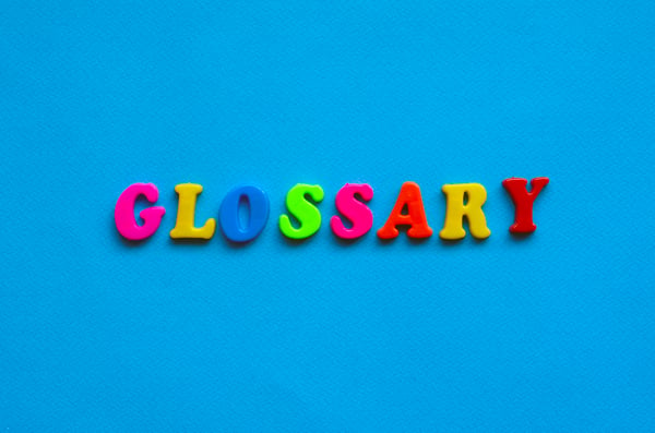 Glossary written in brightly colored letters is the headline for guide to workflow automation terms