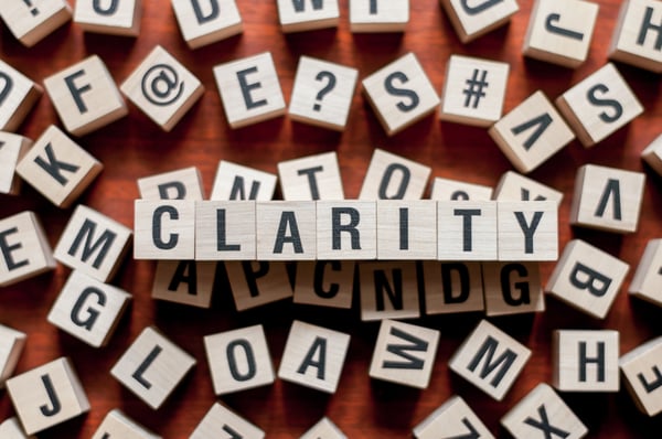 The word clarity spelled out on wooden blocks