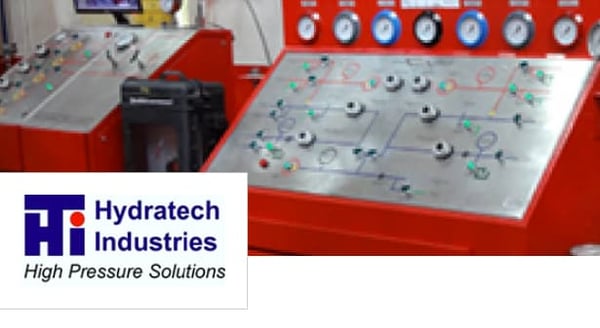 Hydratech Industries logo and red and silver machine control panel