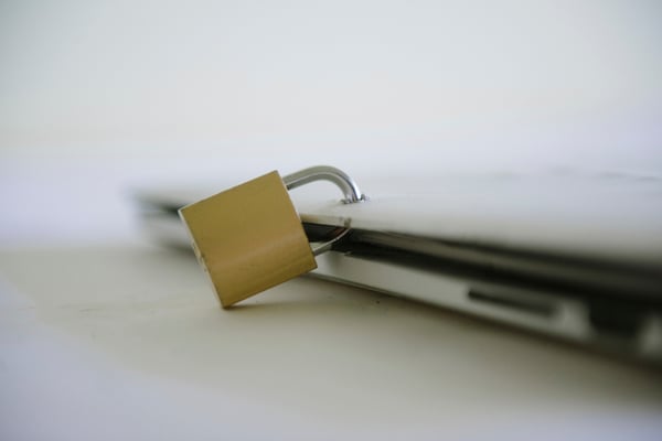 locked laptop illustrates compliance