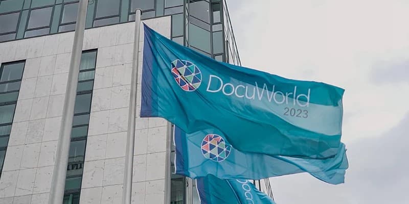Turquoise DocuWorld flags flying proudly