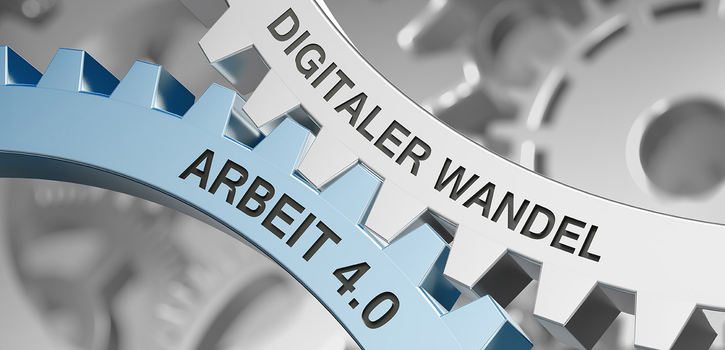 Zwei Zahnräder mit der Aufschrift Arbeit 4.0 und Digitaler Wandel greifen ineinander